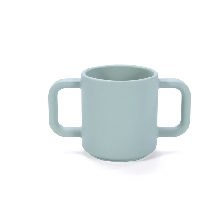 Premium Silicone Open Cup Mint. Premium silicone baby open cup in soft pink with a rounded rim, designed for toddlers learning to drink independently – unbreakable and easy to grip.